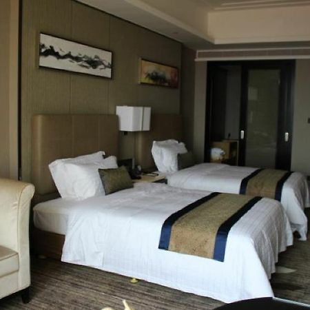Huanggang  New Beacon Walden Hotel מראה חיצוני תמונה